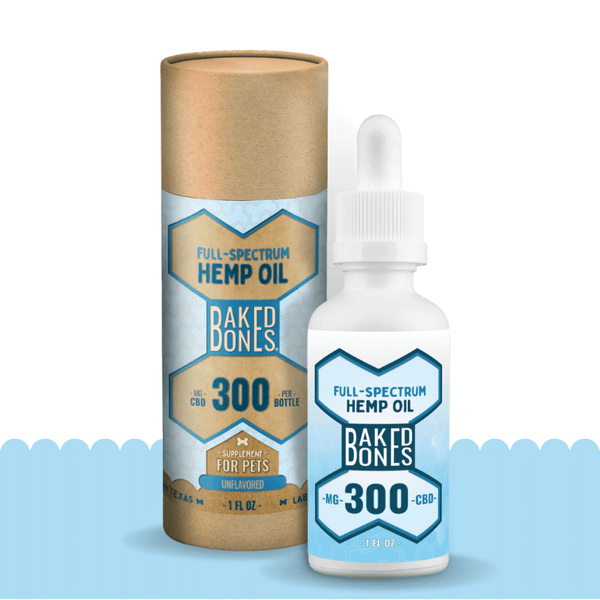 A white bottle with a blue and white label indicating that it contains 300 mg of full-spectrum CBD oil, sitting in front of its packaging, which is a kraft tube with a blue and white label indicating “full spectrum hemp oil for pets containing 300mg of CBD.”